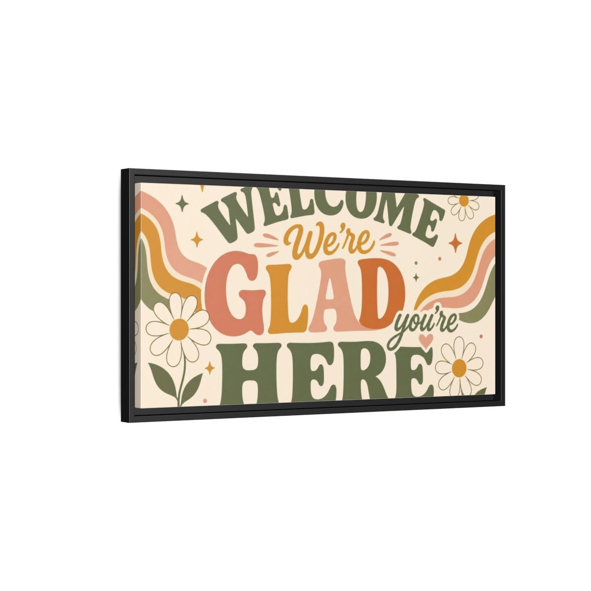 Side Mockup 2. We're Glad You're Here shown as framed canvas print