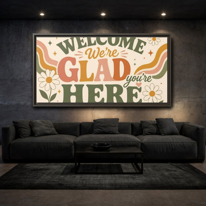 Mockup 3. We're Glad You're Here shown as framed canvas print